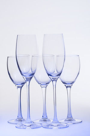 Empty wine glasses   on  uniform background.の写真素材