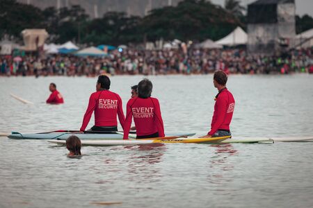 HONOLULU, HAWAII/USA â MAY 28, 2018: Event security gather in harbor for lantern floating ceremony at Ala Moana Beach Park on Magic Island in downtown Honolulu, Oahu, Hawaii, USA. This is an annual Memorial Day event that gathers 50,000 people from arouのeditorial素材