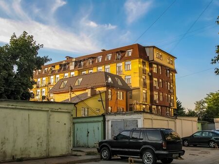 Brand new apartment building on sunny day in Ukraine Dnieper high-rise building on a background of blue sky with white clouds. の写真素材