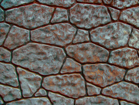 Stone wall background. Decorative stone wall texture. Close-up view of weathered stone wall, grained, natural. Decorative masonry.の写真素材