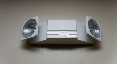 Dual head emergency light mounted on wallの写真素材