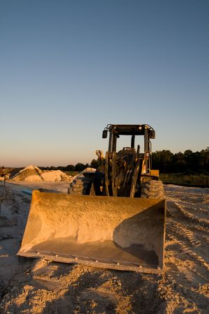 Bulldozer in the golden glow of the late afternoon