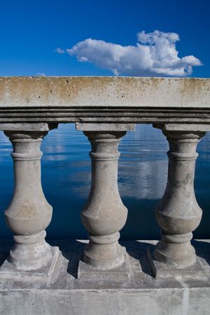 Concrete seaside railing in the mid afternoon