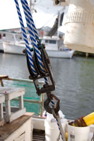 Pulley with ropes closeup on a boat