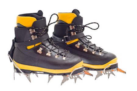 pair of the high mountain boots with crampons