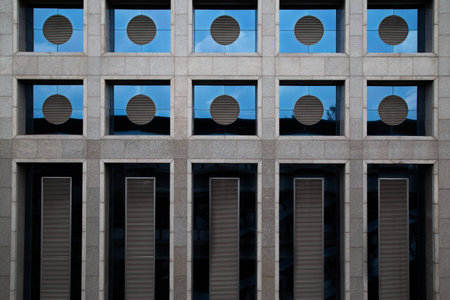 Circle, rectangle of window style in concrete building pattern