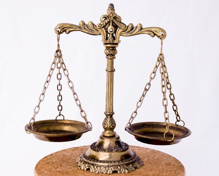 A photo of the scales of justice with a balance theme overlay