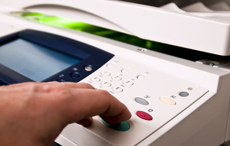 Close-up on a control panel of an office copierの写真素材