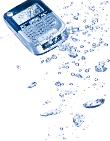 Phone splashing into water against a white backgroundの写真素材