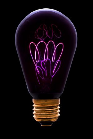 Old infrared lamp isolated on blackの写真素材