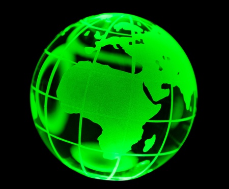 Green Glass globe on a black backgroundの写真素材