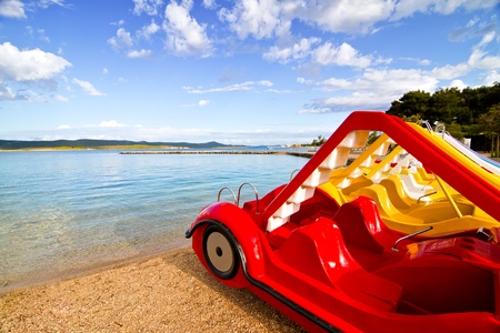 The pedal boat on the beachの写真素材
