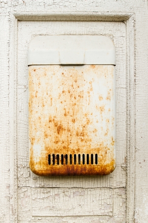 Old white wall with mailbox