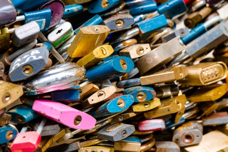 Love locks on a bridge close up shootの写真素材