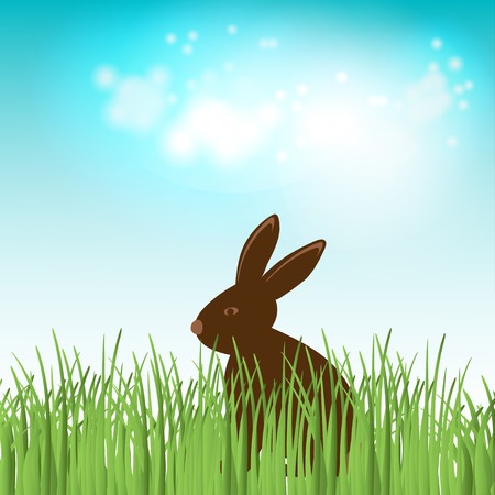 Chocolate bunny in green grass. Easter vector illustrationのイラスト素材