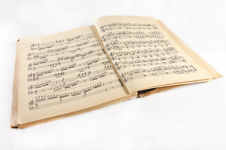 Retro Old  music notes album on a white backgroundの写真素材