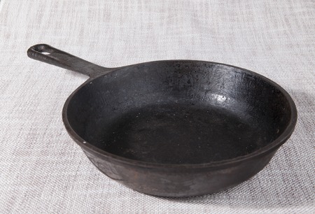 Close up old cast-iron grill pan.の写真素材