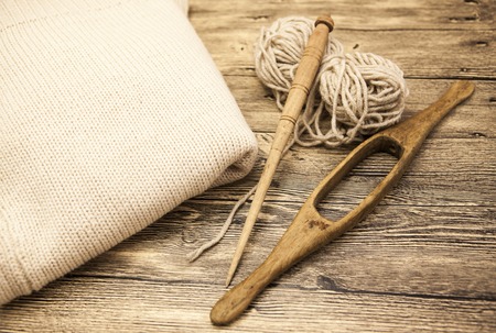 Excellent mocap two old wooden spindle with a ball of wool thread for the manufacture of woolen...