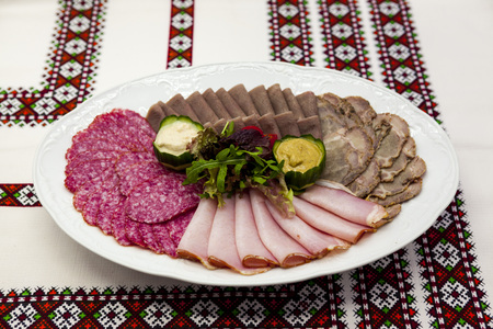 Banquet menu. A delicious assortment of salami, smoked meat, roast beef, beef tongue, horseradish and mustard. Great start lunchの写真素材