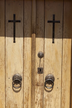 Old door in the stone walls of the village houses. Excellent backgroundの写真素材