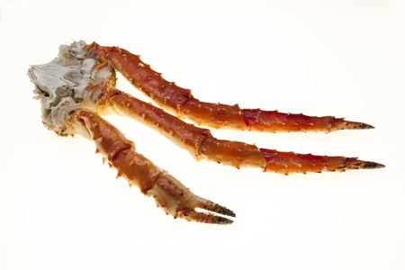 Crab legs closeup on a white background. Far East crab, a delicacy. Crab Cluster.の写真素材