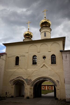 Russian Christian church, a temple on a background of gray sky and cloudsの写真素材