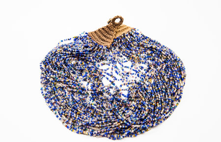 Beautiful beads, necklace made of glass beads, beads on white background. Very sophisticated handmade jewelry.の写真素材
