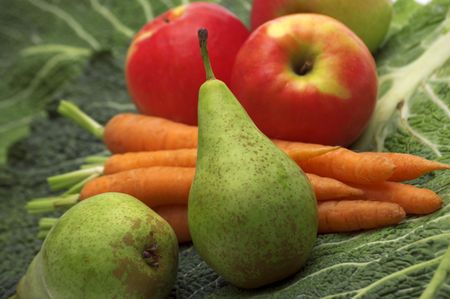 pear on vegetables backgroundの写真素材