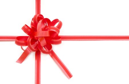 red holiday bow on white background の写真素材