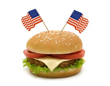 Tasty hamburger with two flags on white backgroundの写真素材