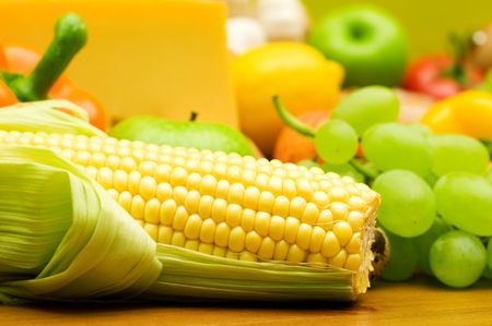 fresh corn on fruits backgroundの写真素材