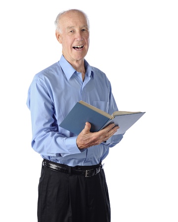 A senior man happily singing from a hymnal   On a white background の写真素材