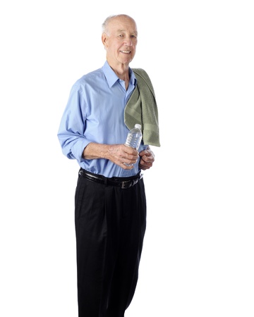 A happy senior walker with a water bottle and a towel draped over his shoulder   On a white background の写真素材
