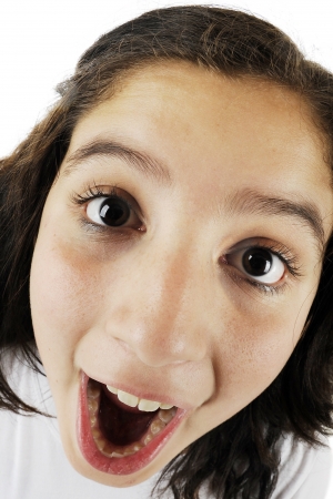 Close-up, fisheye view of an opened-mouth young teen girl   の写真素材
