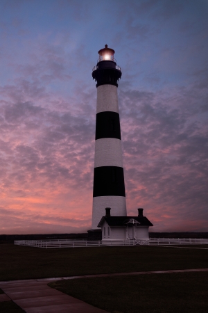 The Bodie Island Light House in NC taken before a cloudy pink and blue sunset..  のeditorial素材
