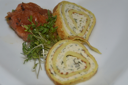 A small greeting from the kitchen. Chicken roulade, pumpkin chutney and cressの写真素材