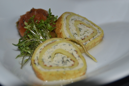 A small greeting from the kitchen. Chicken roulade, pumpkin chutney and cressの写真素材