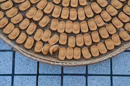 Biscuits in the shape of Chinese gold barsの写真素材