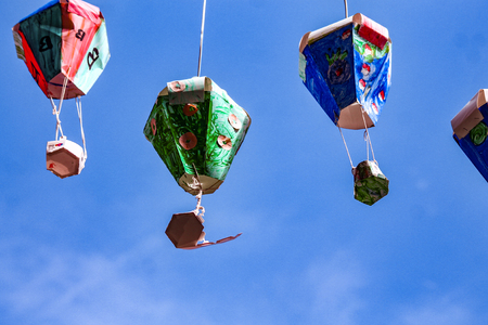 home-made lantern gerlanden with blue backgroundの写真素材