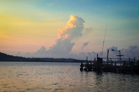 A jetty over the sea with sunsetの写真素材