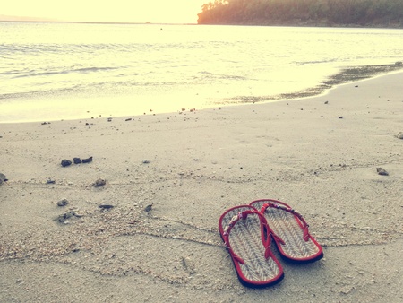 The sun's rays reflect the light in the wavesの写真素材