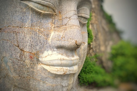 The rock-hewn Buddha head in Battambang in Cambodiaの写真素材