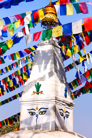 Swayambhunath adorned with prayer flags, one of the oldest proven Buddhist temple, facilities of the world, Kathmandu, Nepalの写真素材