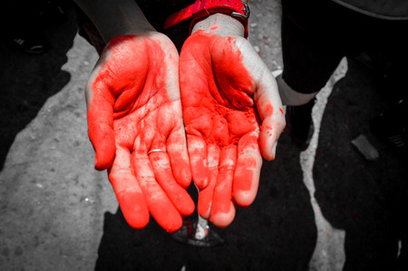 At the Holi Color Festival in Nepal different colored powders are used. Like here the color red