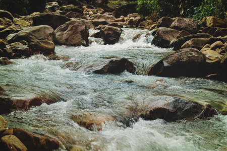 Cinematic scenery of Veal Pouch Waterfall hidden in the forest of Preah Monivong National Park in...