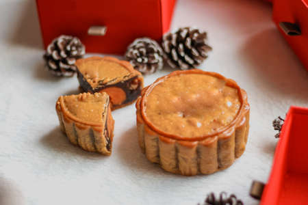 Traditional Moon Cake inside a red box during the Mid-Autumn Festival or Moon cake Festivalの写真素材