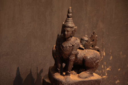 Ornate wooden sculpture display in the famous Baan Dam Museum or Black House in Chiang rai Thailand