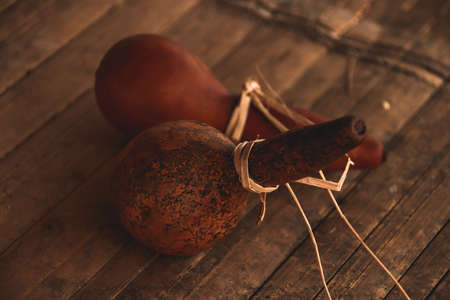 Dry Chinese bottle gourd as traditional water container, hill tribe market, Northern Thailand