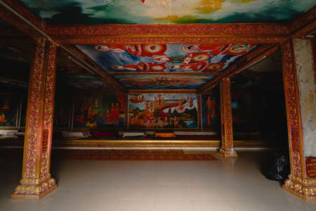 Paintings on the wall and ceiling of Sampov Pram Pagoda atop Bokor Mountain in Preah Monivong National Park in Kampot, Cambodiaのeditorial素材