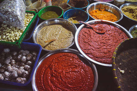 Assorted Indonesian fermented shrimp paste called Trassi, sold in the local market stalls in Medan City North Sumatra, Indonesiaの写真素材